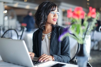 Corporate travel manager making travel arrangements