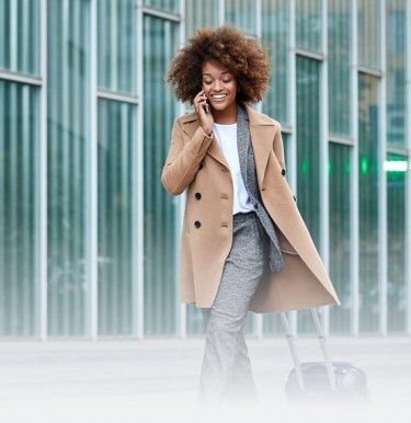 Woman Walking And Speaking On The Cellphone